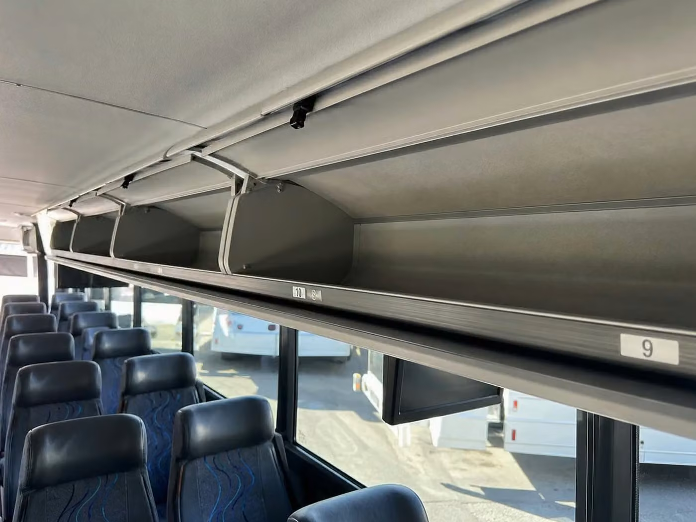 dalton 25 passenger minibus overhead storage