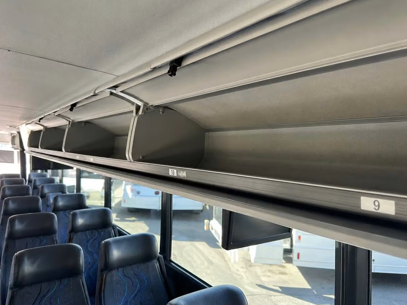 dalton 28 passenger minibus overhead storage
