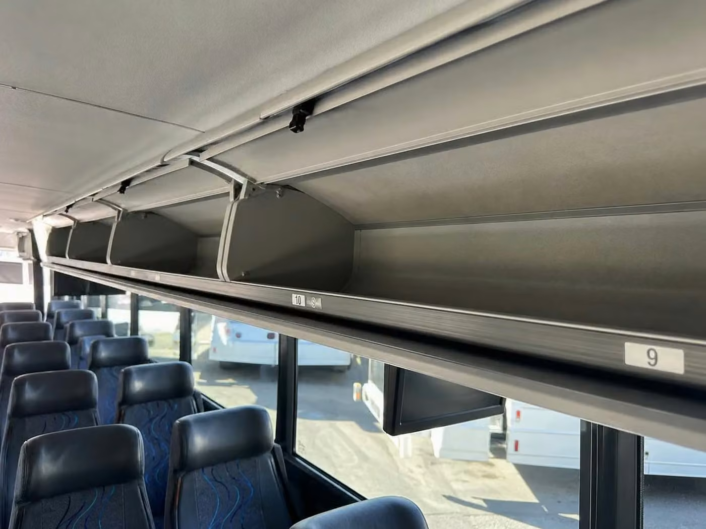 dalton 35 passenger minibus overhead storage