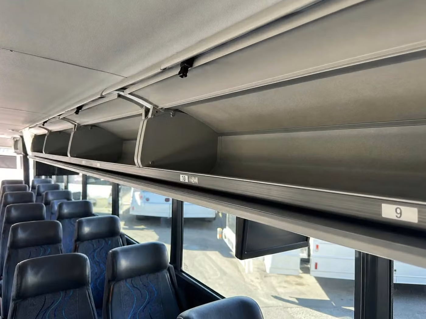 dalton charter bus overhead storage